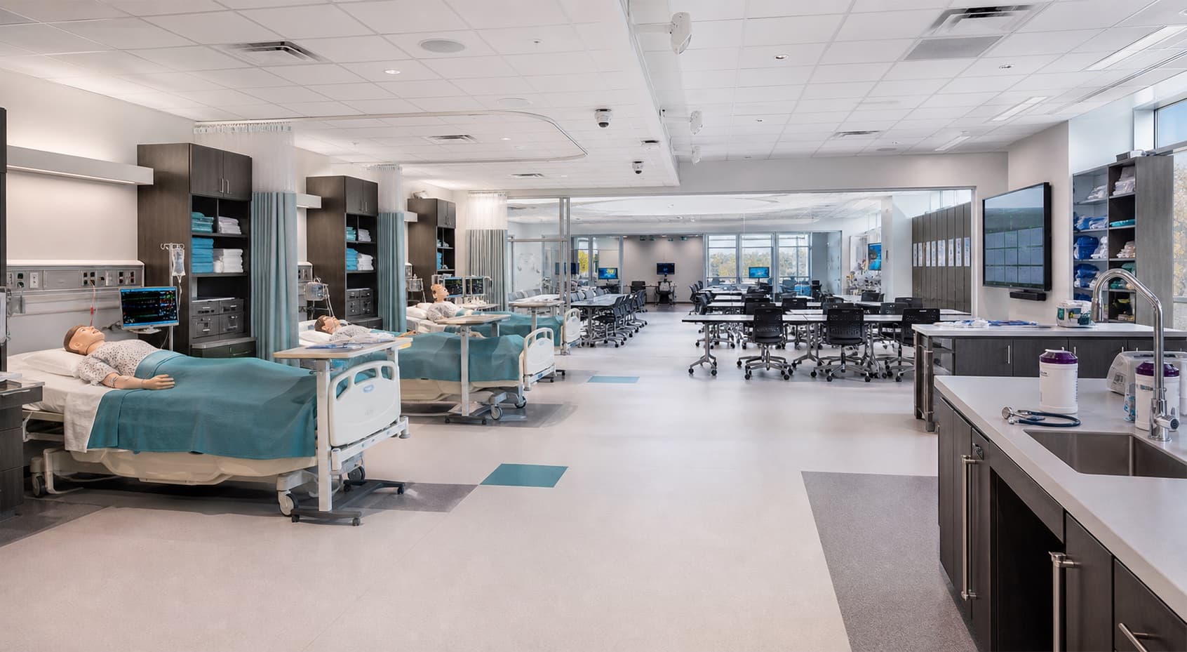 Realistic healthcare simulation lab arranged for multidisciplinary clinical training.